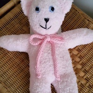 Nahtloser Plüschteddy in rosé